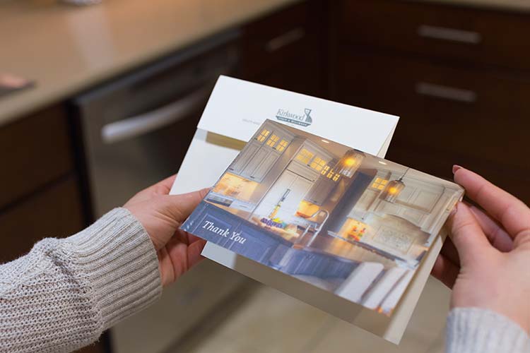 A thank you card featuring a wooden countertop for Kirkwood Stair
